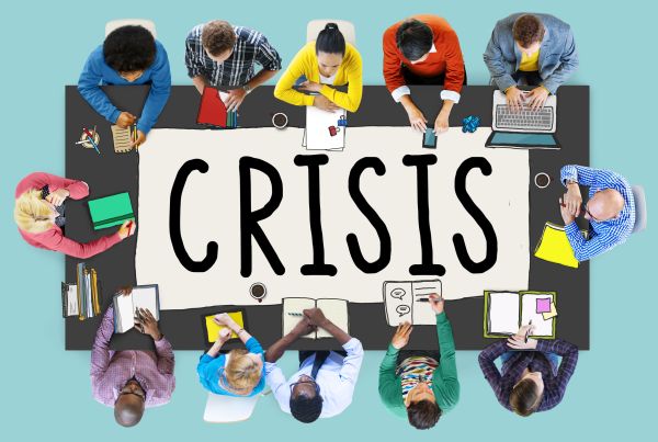 Crisis response meeting visual for healthcare payer communications.